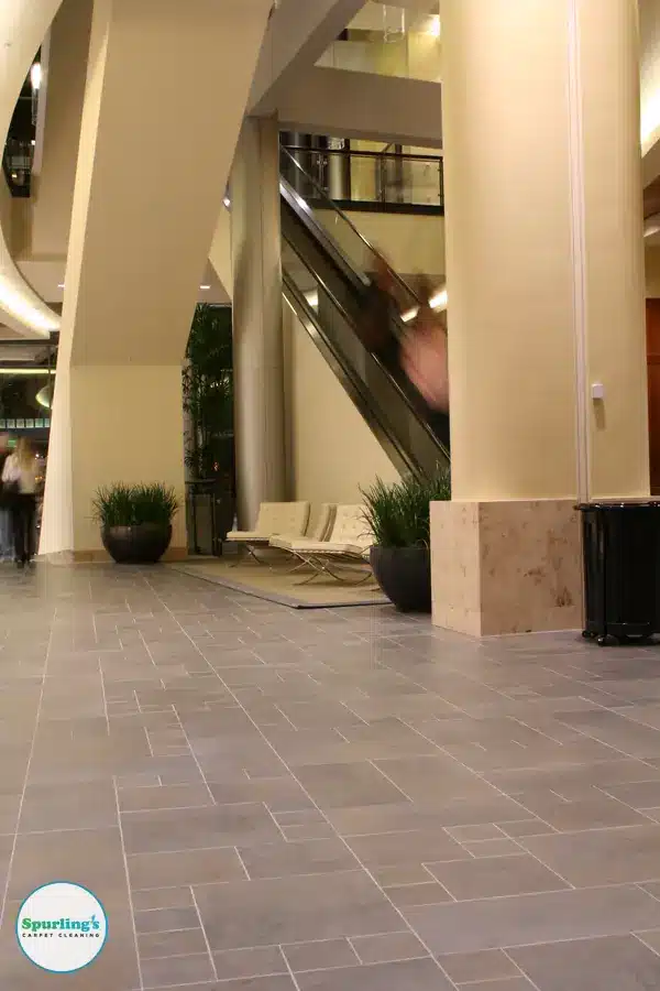 Commercial tile cleaning: large tile floor in a bright building lobby