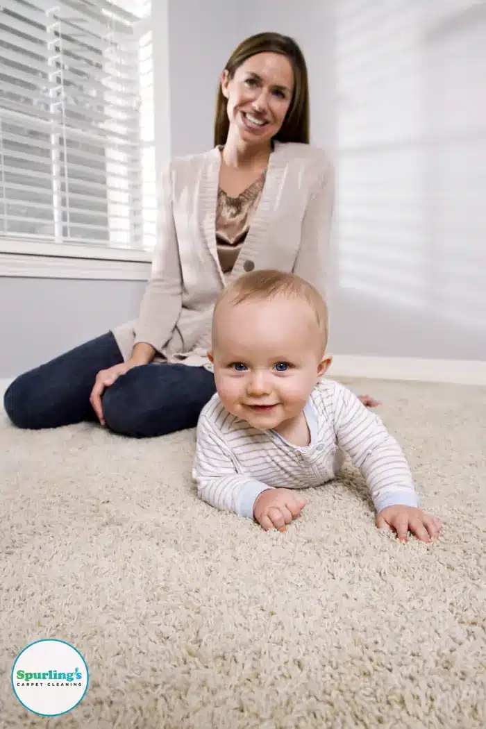 Carpet cleaning Geneva NY, Seneca Falls and Waterloo: mother and baby on clean carpet